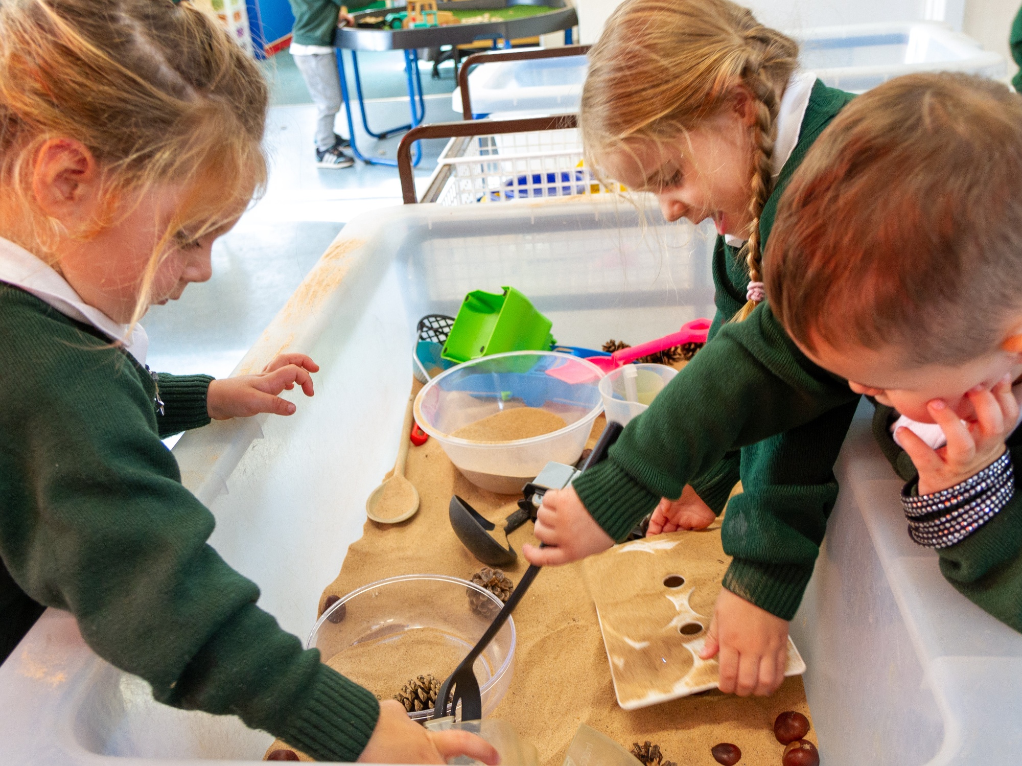 nursery children role playing with toys